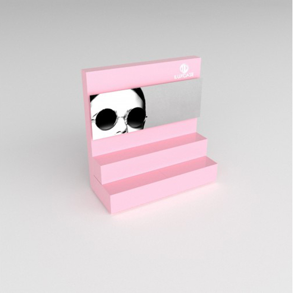 Présentoir de type podium rose pâle